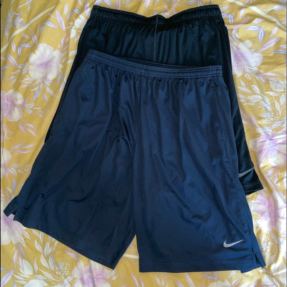 TWO PAIRS OF NIKE DRI FIT SHORTS